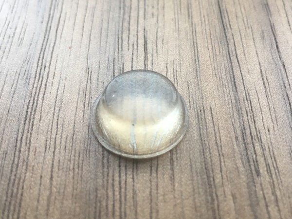 Clear self adhesive button shaped buffers