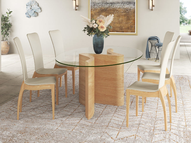 Close-up of dining table with six chairs and a vase of flowers on top