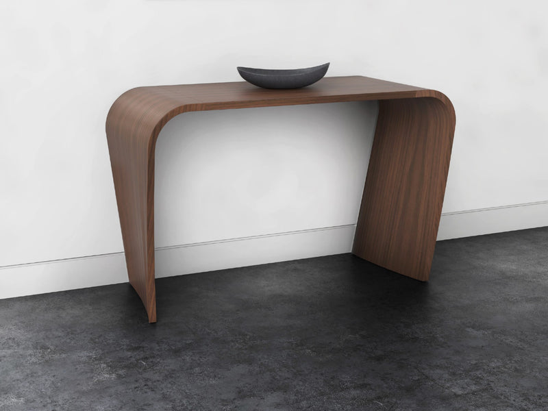Close-up of modern wooden console table with a black bowl on top