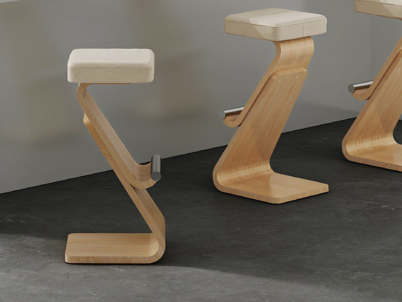 Three wooden stools with white cushions